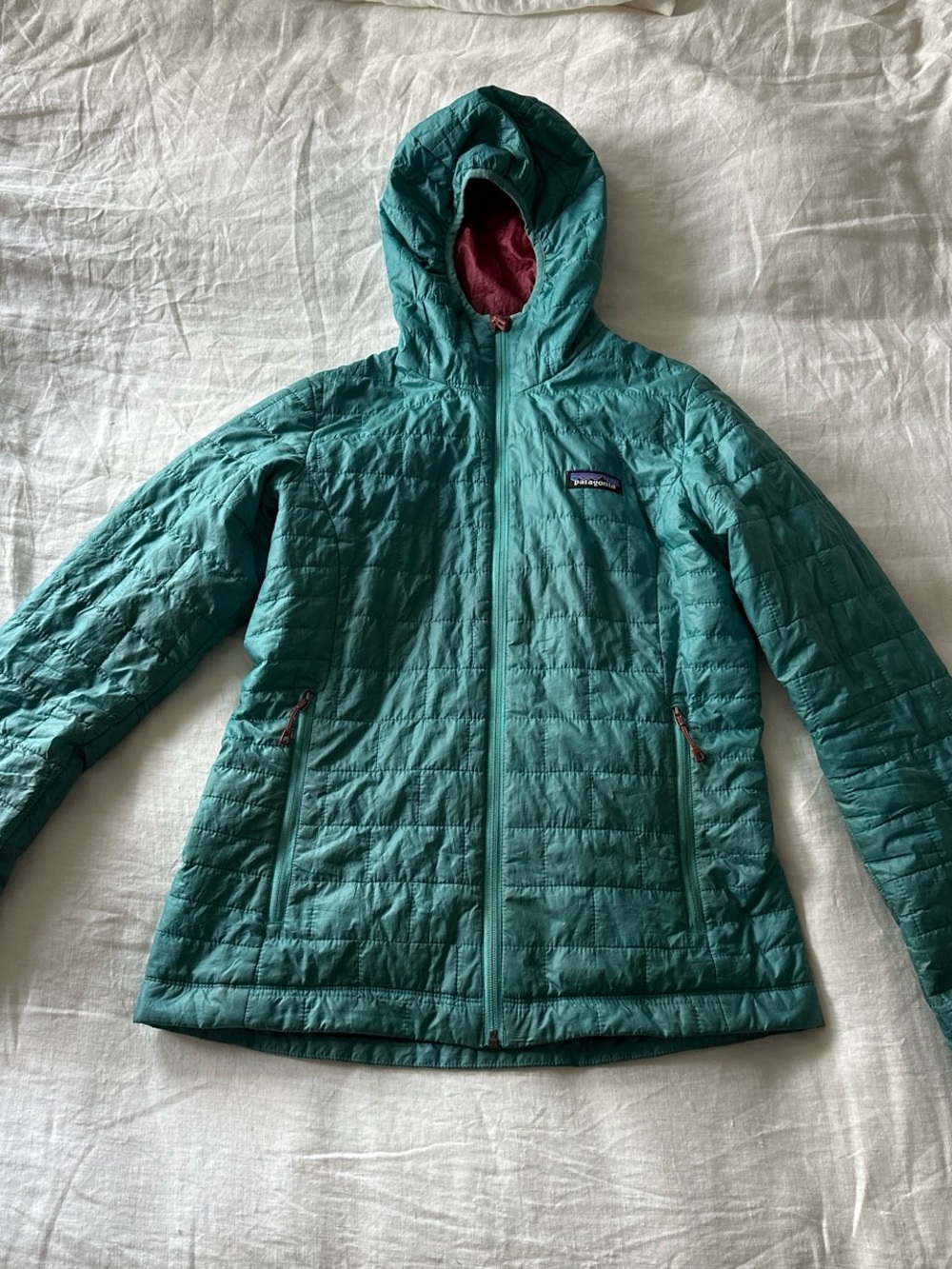 Turquoise Patagonia Nano Puff Insulated Hoodie - Women's with hood.